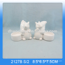 Unique squirrel shaped ceramic animal candle holders in white colour